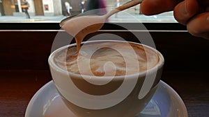 Checking Consistency of a Large Mug of Caffe Latte - Ultra Macro Shot