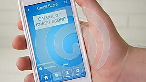 Checking credit score on smartphone using application. The result is EXCELLENT