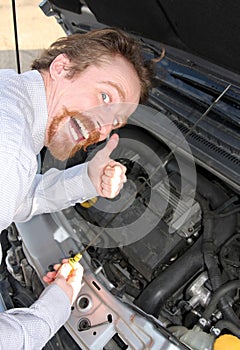 Checking engine oil dipstick