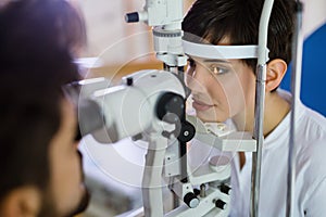 Checking eyesight in a clinic. Ophthalmology. Medicine and health concept.