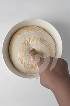 Checking if dough is proofed using a finger