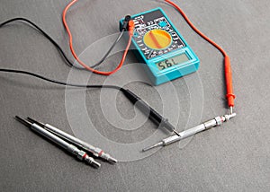 Checking the serviceability of the glow plug with a multimeter. Glow plug voltage resistance. Modern heating element