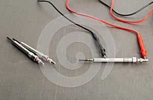 Checking the serviceability of the glow plug with a multimeter. Glow plug voltage resistance. Modern heating element