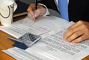 Checking and signing the contract and/or lease photo