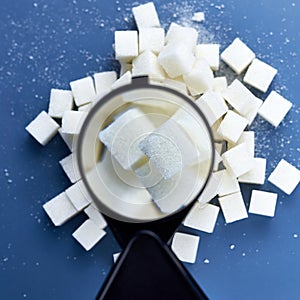 Checking sugar cubes with a magnifying glass