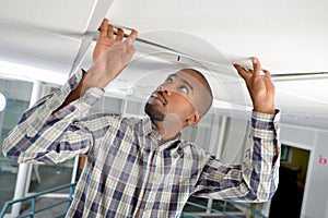 Checking under ceiling panel