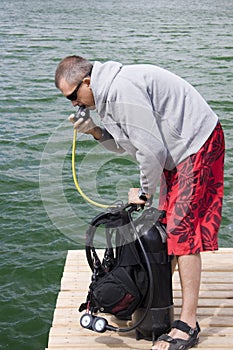 Checking up scuba gear