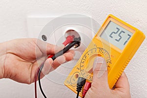 Checking voltage in a wall fixture