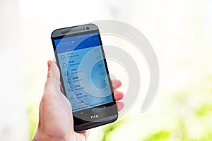 Checking weather on smartphone