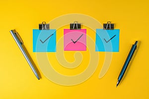 Checklist with checkmarks and notes on blue background