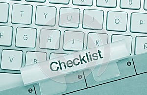 Checklist - Inscription on Blue Keyboard Key