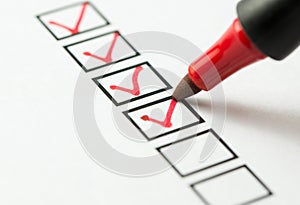 Checklist box marked with red pen photo