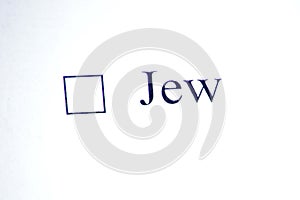 Checklist with a word Jew on white paper. Checkbox and religion concept