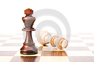 Checkmate black defeats white king photo