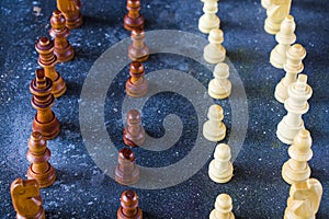 Checkmate and chess Pawn figures close-up