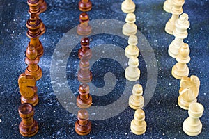 Checkmate and chess Pawn figures close-up