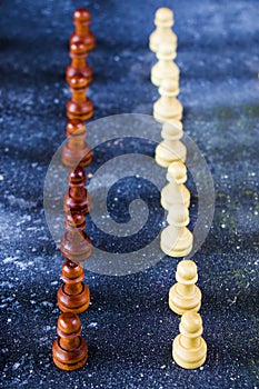 Checkmate and chess Pawn figures close-up