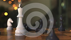 Checkmate or mate in chess game. Chessboard close-up, 3D animation