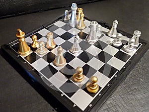 Checkmate to the silver king. Victory of the golden pieces