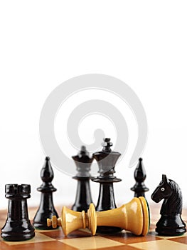 Checkmate the white king. Chess concept with white background for the article.