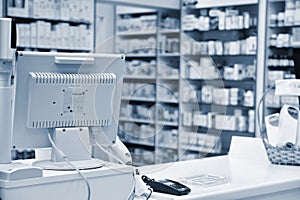 Checkout the pharmacy. Interior pharmacies and blurred background. photo