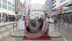 Troops with USA flag on the American part of Checkpoint Charlie photo