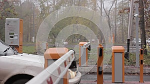 Checkpoint three posts. Automatic road barrier gate lifting gate opens and passes car