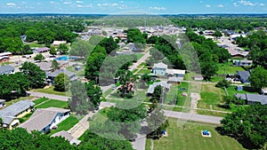 Checotah town of McIntosh County, Oklahoma with suburban residential houses, large backyard, historic downtown Broadway and Main photo