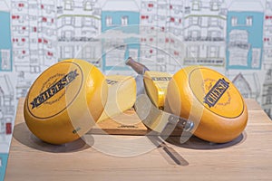 Cheddar cheese on a cutting board