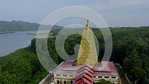 Chedi Phutthakhaya or Puttakaya Pagoda, Wat wang Wiwekaram or wat luang pho uttama in Sangkhlaburi, Kanchanaburi