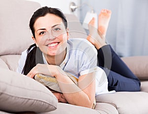 Cheerful adult female relaxation at home