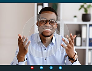 Cheerful african american guy talking and gesturing, pov screen