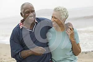 Cheerful African American Mature Couple At Beach