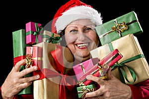 Cheerful Aged Woman Embracing Wrapped Presents