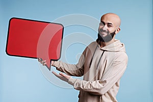 Cheerful arab man with comic balloon