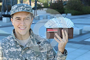 Cheerful army soldier with full wallet