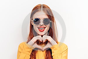cheerful attractive woman in yellow shirt fashionable clothes sunglasses