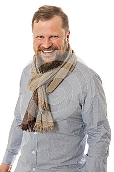 Cheerful bearded man dressed in shirt and kerchief