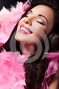 Cheerful Beauty Girl with Pink Feathers Having Fun - Pleasure