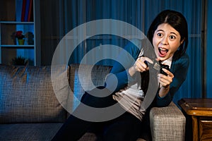 Cheerful beauty woman using handheld controller