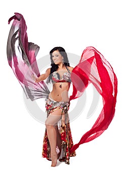 Cheerful Belly Dancer Dancing with Multicolored Veils