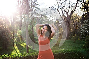 Cheerful black afro woman outdoors