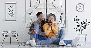 Cheerful black couple planning and imagining new house interior
