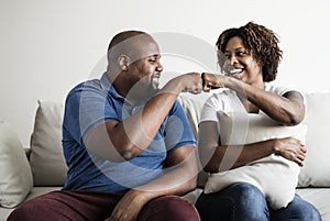 A cheerful black couple spending time together
