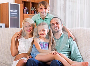 Cheerful boy with her family