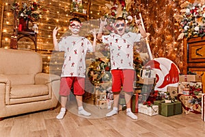 cheerful boys in red shorts for Christmas