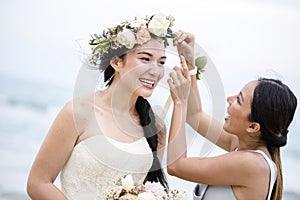 Cheerful bride at the beach