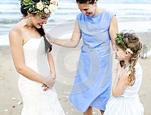 Cheerful bride at the beach