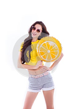 Cheerful Bright Girl in glasses with a yellow balloon on an isolated white background.