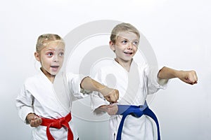 Cheerful brother and sister athletes a punch arm